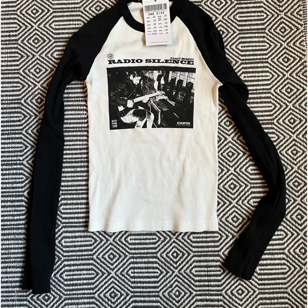 Long sleeve baseball style Brandy Melville Radio Silence tee. NWT.